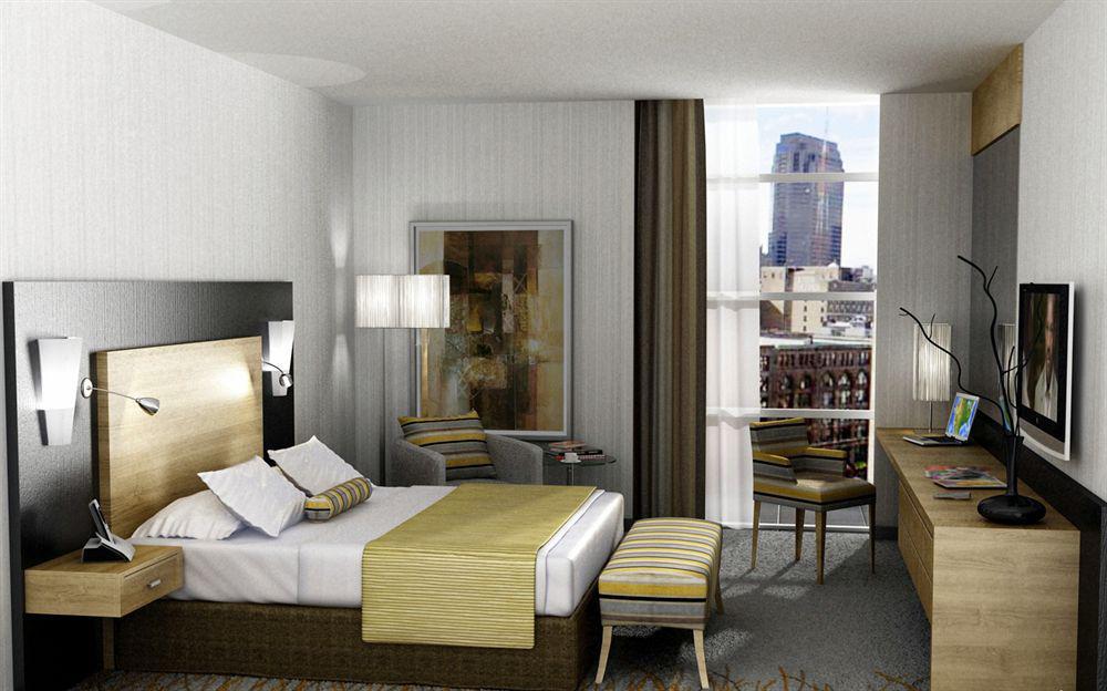 Hala Arjaan By Rotana, Deluxe Hotel Apartments Αμπού Ντάμπι Δωμάτιο φωτογραφία